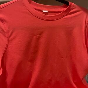 Hot pink Lululemon cropped shirt